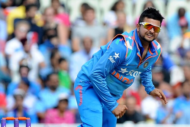 India's Suresh Raina during the fourth One day International match between England and India at Edgbaston cricket ground, Birmingham, England, Tuesday, Sept 2, 2014. (AP Photo/Rui Vieira)