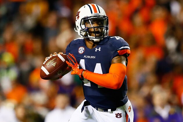 AUBURN, AL - OCTOBER 04:  Nick Marshall #14 of the Auburn Tigers rolls out of the pocket against the LSU Tigers at Jordan Hare Stadium on October 4, 2014 in Auburn, Alabama.  (Photo by Kevin C. Cox/Getty Images)
