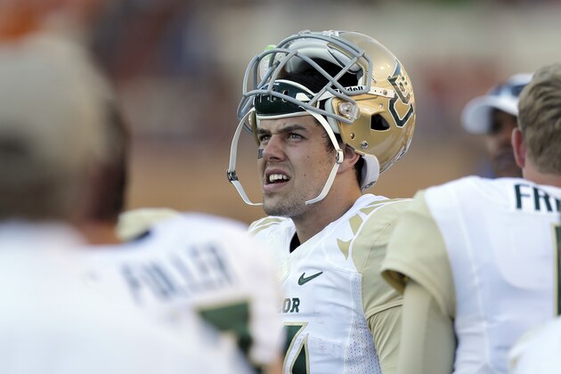 Baylor's Bryce Petty, center, stands on the sidelines during the second half of an NCAA college football game against Texas, Saturday, Oct. 4, 2014, in Austin, Texas. (AP Photo/Eric Gay)