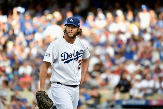 LOS ANGELES, CA - OCTOBER 03:  Starting pitcher Clayton Kershaw #22 of the Los Angeles Dodgers walks back to the mound after striking out Jhonny Peralta #27 of the St. Louis Cardinals in the fourth inning of Game One of the National League Division Series at Dodger Stadium on October 3, 2014 in Los Angeles, California.  (Photo by Kevork Djansezian/Getty Images)