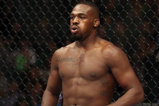 Jon Jones is seen in the ring before his UFC 159 Mixed Martial Arts light heavyweight title bout in Newark, NJ, Saturday, April 27,2013.  Jones retained his title via first round TKO. (AP Photo/Gregory Payan)