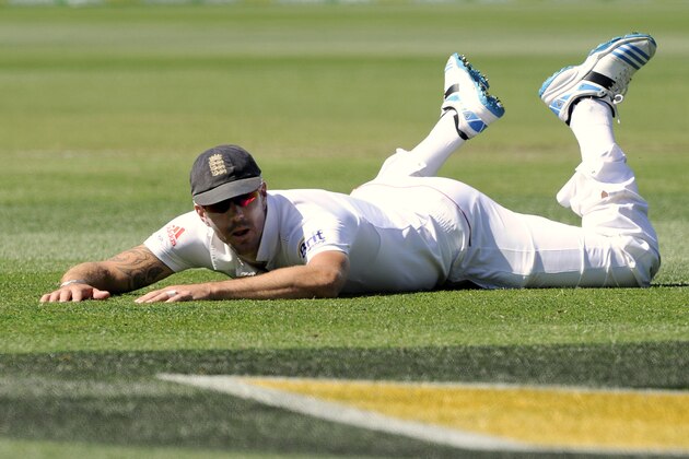 England's Kevin Pietersen lays on the ground after a fielding attempt against Australia during their Ashes cricket test match, Friday, Dec. 27, 2013, at the Melbourne Cricket Ground in Melbourne, Australia. England made 255 runs in their first innings. (AP Photo/Andy Brownbill)