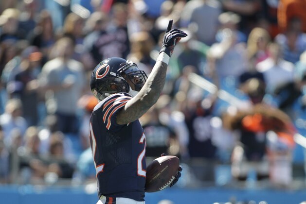 Chicago Bears' Matt Forte (22) reacts after running for a touchdown against the Carolina Panthers during the first half of an NFL football game in Charlotte, N.C., Sunday, Oct. 5, 2014. (AP Photo/Bob Leverone)