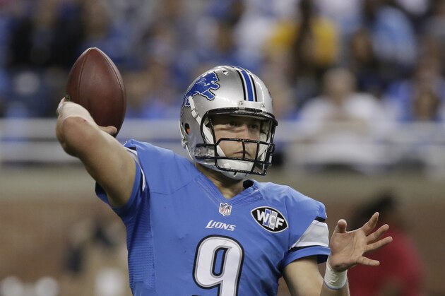 Detroit Lions quarterback Matthew Stafford (9) passes against the Buffalo Bills during an NFL football game Sunday, Oct. 5, 2014, in Detroit. (AP Photo/Duane Burleson)