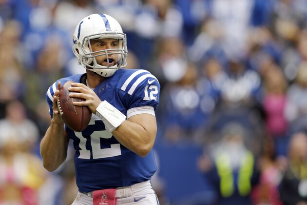 Indianapolis Colts quarterback Andrew Luck throws against the Baltimore Ravens during the first half of an NFL football game in Indianapolis, Sunday, Oct. 5, 2014. (AP Photo/Jeff Roberson)