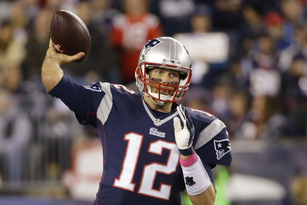 New England Patriots quarterback Tom Brady (12) pass the football in the first half of an NFL football game against the Cincinnati Bengals Sunday, Oct. 5, 2014, in Foxborough, Mass. (AP Photo/Stephan Savoia)