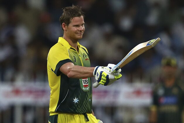 SHARJAH, UNITED ARAB EMIRATES - OCTOBER 07:Steve Smith of Australia celebrates after reacing his century  during the first match of the one day international series between Australia and Pakistan at Sharjah Cricket Stadium on October 7, 2014 in Sharjah, United Arab Emirates.  (Photo by Francois Nel/Getty Images)