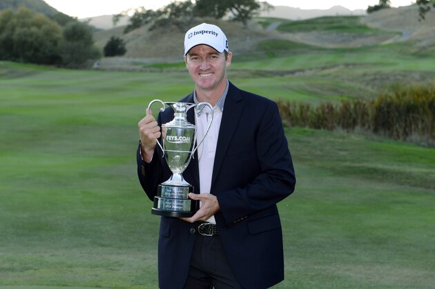 SAN MARTIN, CA - OCTOBER 13:  Jimmy Walker poses with the winner's trophy after winning the Frys.com Open at the CordeValle Golf Club on October 13, 2013 in San Martin, California.  (Photo by Robert Laberge/Getty Images)