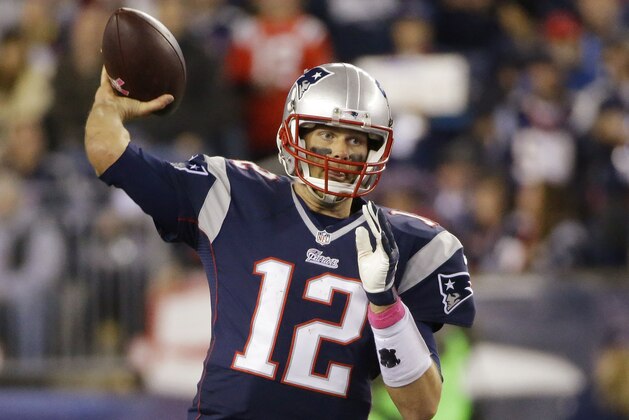 New England Patriots quarterback Tom Brady (12) pass the football in the first half of an NFL football game against the Cincinnati Bengals Sunday, Oct. 5, 2014, in Foxborough, Mass. (AP Photo/Stephan Savoia) New England Patriots quarterback Tom Brady (12) pass the football in the first half of an NFL football game against the Cincinnati Bengals Sunday, Oct. 5, 2014, in Foxborough, Mass. (AP Photo/Stephan Savoia)
