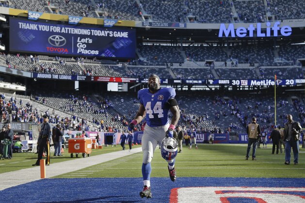 New York Giants running back Andre Williams runs off the field after an NFL football game against the Atlanta Falcons, Sunday, Oct. 5, 2014, in East Rutherford, N.J. The Giants won 30-20. (AP Photo/Seth Wenig)