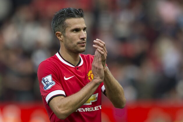 Manchester United's Robin van Persie is seen during his team's Queens Park Rangers' during their English Premier League soccer match at Old Trafford Stadium, Manchester, England, Sunday Sept. 14, 2014. (AP Photo/Jon Super)