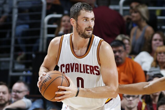 CLEVELAND, OH - OCTOBER 5:  Kevin Love #0 of the Cleveland Cavaliers controls the ball against Devin Smith #6 of the Maccabi Tel Aviv at The Quicken Loans Arena on October 16, 2014 in Cleveland, Ohio. NOTE TO USER: User expressly acknowledges and agrees that, by downloading and/or using this Photograph, user is consenting to the terms and conditions of the Getty Images License Agreement. Mandatory Copyright Notice: Copyright 2014 NBAE (Photo by Chris Covatta/NBAE via Getty Images)