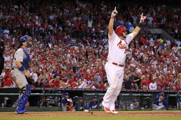 St. Louis Cardinals first baseman Matt Adams celebrates after hitting a three-run home in the seventh inning of Game 4 of baseball's NL Division Series against the Los Angeles Dodgers, Tuesday, Oct. 7, 2014, in St. Louis.(AP Photo/Jeff Roberson)