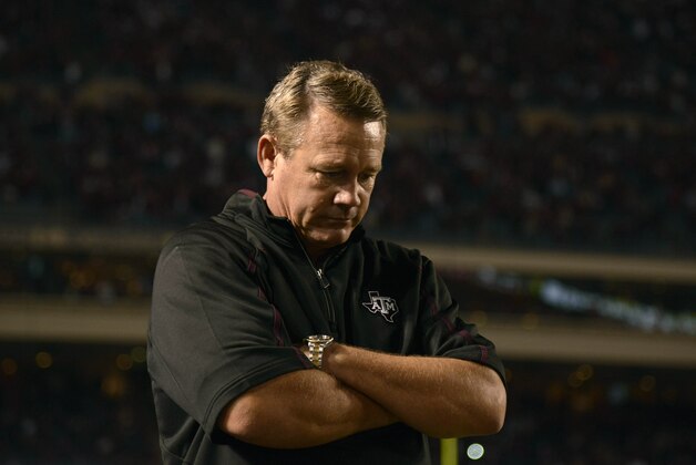 Nov 9, 2013; College Station, TX, USA; Texas A&M Aggies defensive coordinator Mark Snyder waits while the referees review a call against the Mississippi State Bulldogs during the second half at Kyle Field. Texas A&M won 51-41. Mandatory Credit: Thomas Campbell-USA TODAY Sports