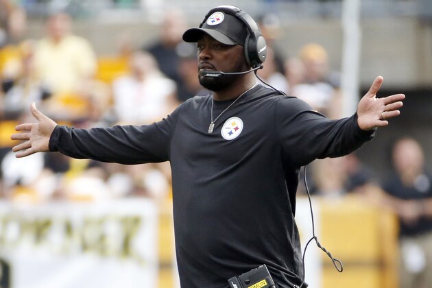 Pittsburgh Steelers head coach Mike Tomlin looks for a call in the third quarter of an NFL football game against the Tampa Bay Buccaneers, Sunday, Sept. 28, 2014, in Pittsburgh. (AP Photo/Gene J. Puskar)