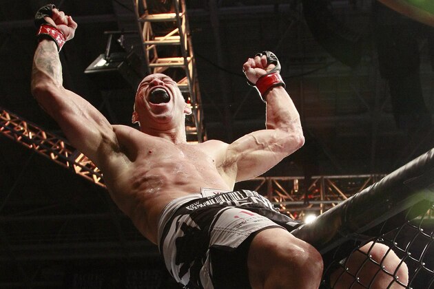 Wanderlei Silva celebrates after beating Cung Le during a UFC 139 Mixed Martial Arts middleweight bout in San Jose, Calif., Saturday, Nov. 19, 2011. Silva won by TKO in the second round. (AP Photo/Jeff Chiu)