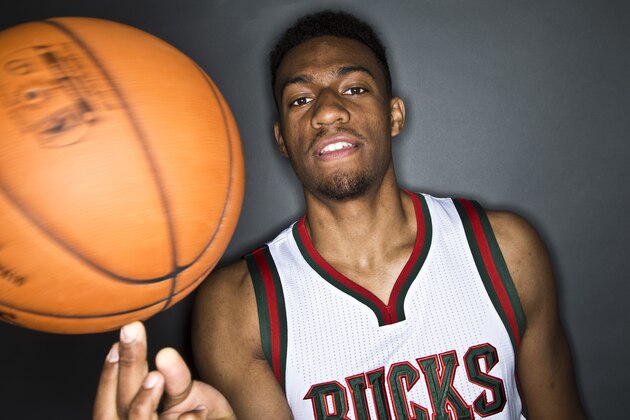 Milwaukee Bucks' Jabari Parker balances a ball on his finger during the team's media day Monday, Sept. 29, 2014, in St. Francis, Wis. (AP Photo/Morry Gash)