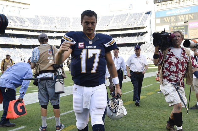 San Diego Chargers quarterback Philip Rivers (17) pumps his fist after the Chargers beat the New York Jets 31-0 in an NFL football game Sunday, Oct. 5, 2014, in San Diego.  (AP Photo/Denis Poroy)
