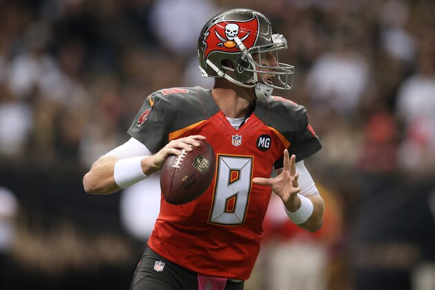 NEW ORLEANS, LA - OCTOBER 05:  Mike Glennon #8 of the Tampa Bay Buccaneers throws a pass against the New Orleans Saints at the Mercedes-Benz Superdome on October 5, 2014 in New Orleans, Louisiana.  (Photo by Chris Graythen/Getty Images)
