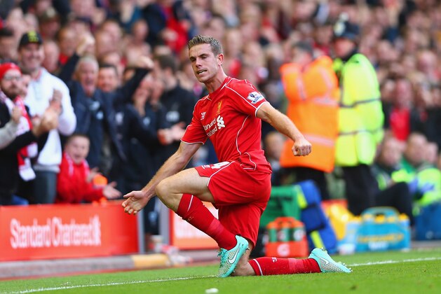 LIVERPOOL, ENGLAND - OCTOBER 04:  Jordan Henderson of Liverpool celebrates scoring their second goal during the Barclays Premier League match between Liverpool and West Bromwich Albion at Anfield on October 4, 2014 in Liverpool, England.  (Photo by Clive Brunskill/Getty Images)