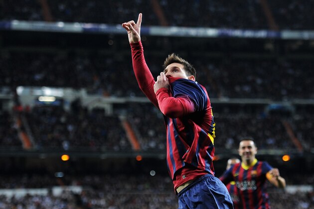 MADRID, SPAIN - MARCH 23:  Lionel Messi of Barcelona celebrates scoring his team's fourth goal during the La Liga match between Real Madrid CF and FC Barcelona at the Bernabeu on March 23, 2014 in Madrid, Spain.  (Photo by Denis Doyle/Getty Images)