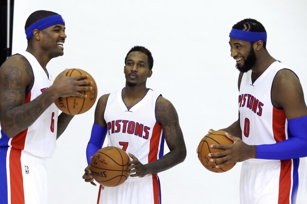 Detroit Pistons forward Josh Smith, left, guard Brandon Jennings, center, and center Andre Drummond stand around during media day at the NBA team's basketball training facility in Auburn Hills, Mich., Monday, Sept. 29, 2014. (AP Photo/Carlos Osorio)
