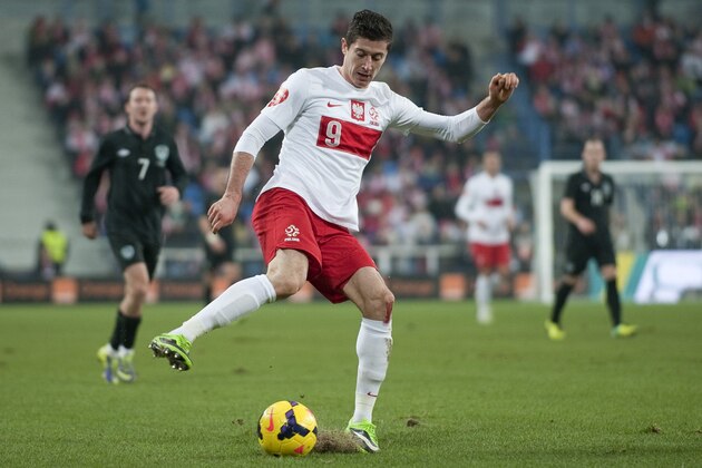 POZNAN, POLAND - NOVEMBER 19: Poland's Robert Lewandowski controls the ball during the International friendly match between Poland and Ireland at the Inea Stadium on November 19, 2013 in Poznan, Poland.  (Photo by Adam Nurkiewicz/Getty Images)