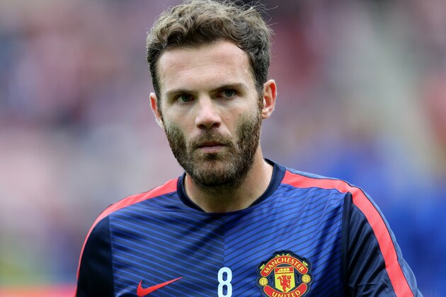 Manchester United's Juan Mata ahead of  their English Premier League soccer match against Sunderland at the Stadium of Light, Sunderland, England, Sunday, Aug. 24, 2014. (AP Photo/Scott Heppell)