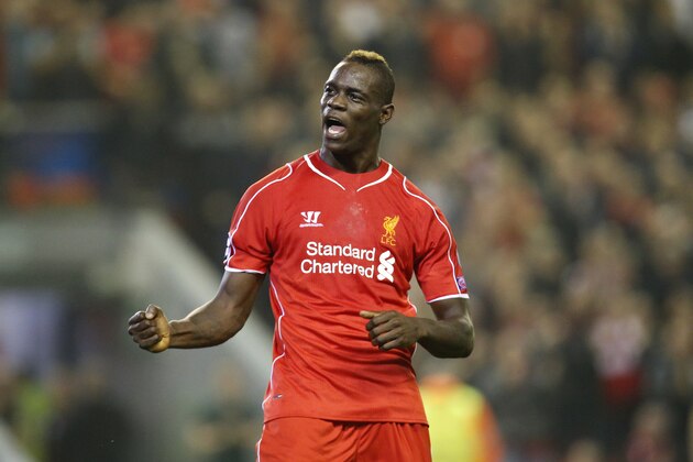 Liverpool's Mario Balotelli celebrates after scoring against Ludogorets during the Champions League Group B soccer match between Liverpool and Ludogorets at Anfield Stadium in Liverpool, England, Tuesday, Sept. 16, 2014. (AP Photo/Jon Super)