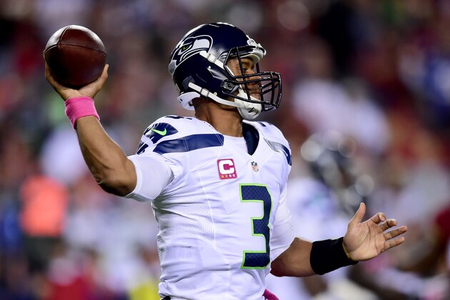 LANDOVER, MD - OCTOBER 06: Quarterback Russell Wilson #3 of the Seattle Seahawks drops back to pass in the first quarter of a game against the Washington Redskins at FedExField on October 6, 2014 in Landover, Maryland.  (Photo by Patrick Smith/Getty Images)