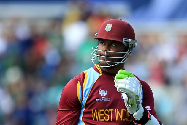 LONDON, ENGLAND - JUNE 07:  Marlon Samuels of West Indies walks off after being stumped during the ICC Champions Trophy group B match between West Indies and Pakistan at The Oval on June 7, 2013 in London, England.  (Photo by Richard Heathcote/Getty Images)