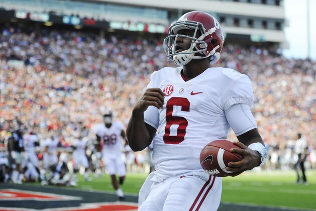 Oct 4, 2014; Oxford, MS, USA; Alabama Crimson Tide quarterback Blake Sims (6) scores on a quarterback keep during the first half against Mississippi Rebels at Vaught-Hemingway Stadium. Mandatory Credit: Christopher Hanewinckel-USA TODAY Sports