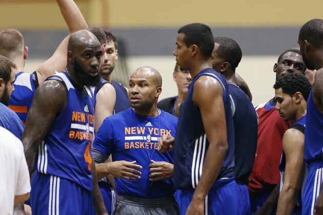 New York Knicks basketball  coach Derek Fisher talks to players during practice at the team's NBA training camp at the U.S. Military Academy on Tuesday, Sept. 30, 2014, in West Point, N.Y. (AP Photo/Mike Groll)
