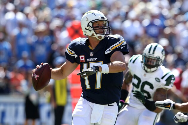 SAN DIEGO, CA - OCTOBER 05:  Philip Rivers #17 of the San Diego Chargers throws a pass against the New York Jets at Qualcomm Stadium on October 5, 2014 in San Diego, California.  (Photo by Stephen Dunn/Getty Images)