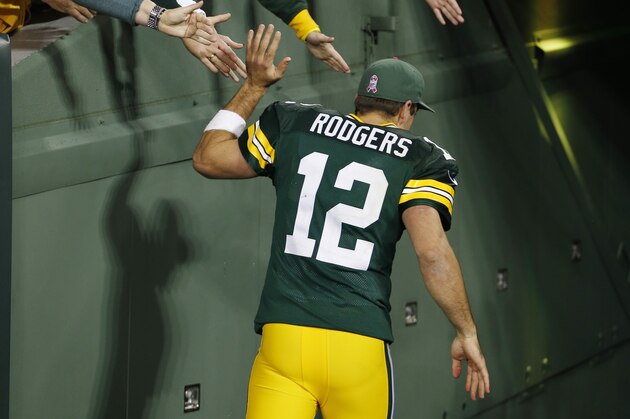 Green Bay Packers' Aaron Rodgers an NFL football game against the Minnesota Vikings Thursday, Oct. 2, 2014, in Green Bay, Wis. The Packers won 42-10. (AP Photo/Mike Roemer)