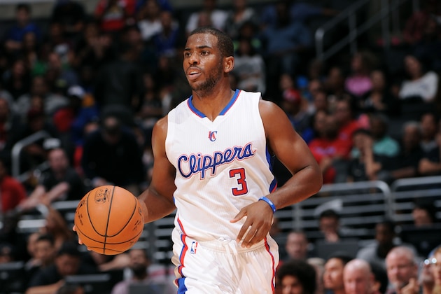 LOS ANGELES, CA - OCTOBER 7: Chris Paul #3 of the Los Angeles Clippers handles the basketball during a game against the Golden State Warriors on October 7, 2014 at the Staples Center in Los Angeles, California. NOTE TO USER:  User expressly acknowledges and agrees that, by downloading and or using this Photograph, user is consenting to the terms and conditions of the Getty Images License Agreement.  Mandatory Copyright Notice:  Copyright 2014 NBAE (Photo by Juan O'Campo/NBAE via Getty Images)