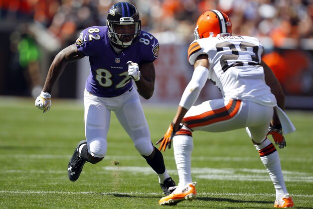 Baltimore Ravens wide receiver Torrey Smith (82) is defended by Cleveland Browns cornerback Joe Haden (23) during an NFL game at the FirstEnergy Stadium in Cleveland on Sunday, Sept. 21, 2014. (Jeff Haynes/AP Images for Panini)