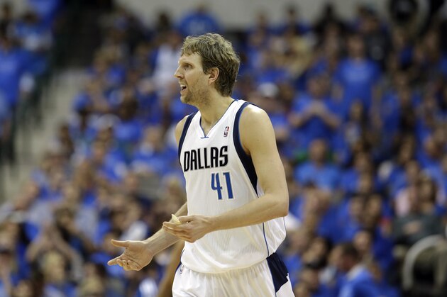 Dallas Mavericks' Dirk Nowitzki (41) of Germany looks for an explanation from an official in Game 4 of an NBA basketball first-round playoff series against the San Antonio Spurs, Monday, April 28, 2014, in Dallas. (AP Photo/Tony Gutierrez)