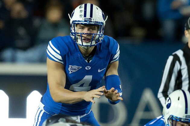 Oct 3, 2014; Provo, UT, USA; Brigham Young Cougars quarterback Taysom Hill (4) awaits the snap during the first quarter against the Utah State Aggies at Lavell Edwards Stadium. Mandatory Credit: Russ Isabella-USA TODAY Sports