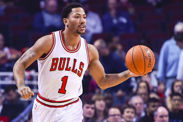 Oct 6, 2014; Chicago, IL, USA; Chicago Bulls guard Derrick Rose (1) dribbles the ball against the Washington Wizards during the first quarter at the United Center. Mandatory Credit: Mike DiNovo-USA TODAY Sports