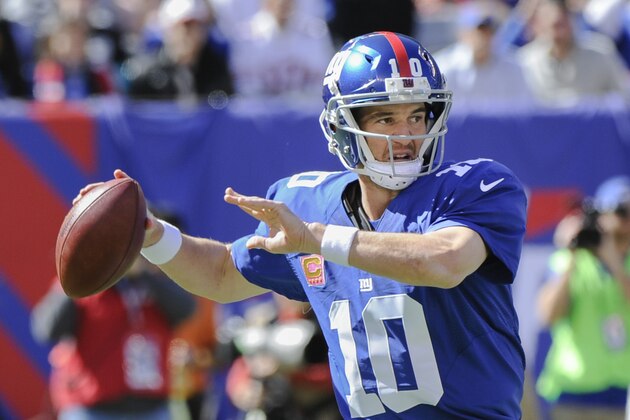 New York Giants quarterback Eli Manning looks to pass against the Atlanta Falcons during the first half of an NFL football game, Sunday, Oct. 5, 2014, in East Rutherford, N.J. (AP Photo/Bill Kostroun)