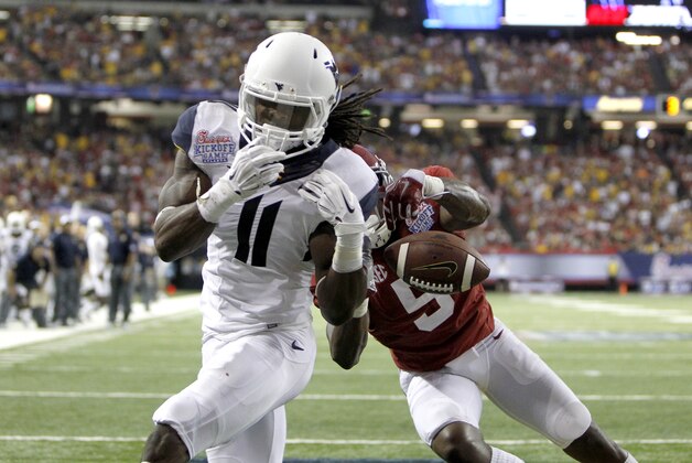 Aug 30, 2014; Atlanta, GA, USA; Alabama Crimson Tide defensive back Cyrus Jones (5) breaks up this pass intended for West Virginia Mountaineers wide receiver Kevin White (11) in the end zone in the fourth quarter of the 2014 Chick-fil-A Kickoff Game at the Georgia Dome. Mandatory Credit: Brett Davis-USA TODAY Sports