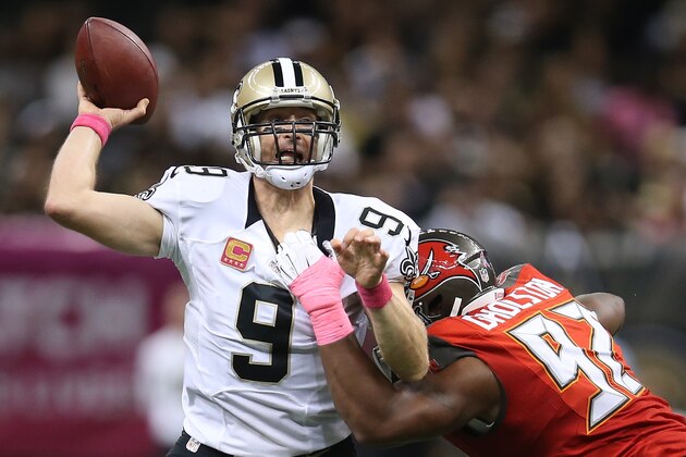 NEW ORLEANS, LA - OCTOBER 05:  Drew Brees #9 of the New Orleans Saints throws a pass against the Tampa Bay Buccaneers  at the Mercedes-Benz Superdome on October 5, 2014 in New Orleans, Louisiana.  (Photo by Chris Graythen/Getty Images)