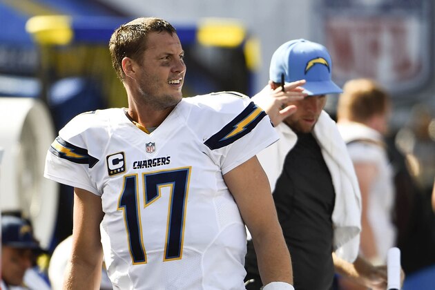 San Diego Chargers quarterback Philip Rivers (17) looks on from the sidelines during an NFL football game against the Jacksonville Jaguars Sunday, Sept.  28, 2014 in San Diego. The Chargers won 33-14. (AP Photo/Denis Poroy)
