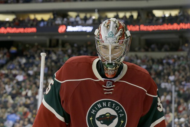 Minnesota Wild goalie Darcy Kuemper skates around during a timeout during the second period of a preseason NHL hockey game against the St. Louis Blues in St. Paul, Minn., Saturday, Oct. 4, 2014. (AP Photo/Ann Heisenfelt)