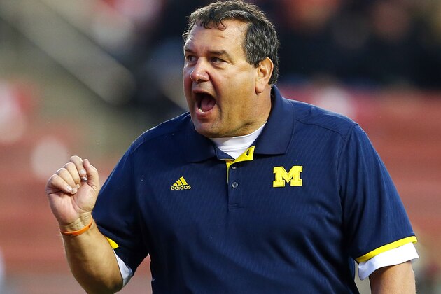 Michigan head coach Brady Hoke looks on during pre game warmups before their NCAA college football game against Rutgers Saturday, Oct. 4, 2014, in Piscataway, N.J. (AP Photo/Rich Schultz)