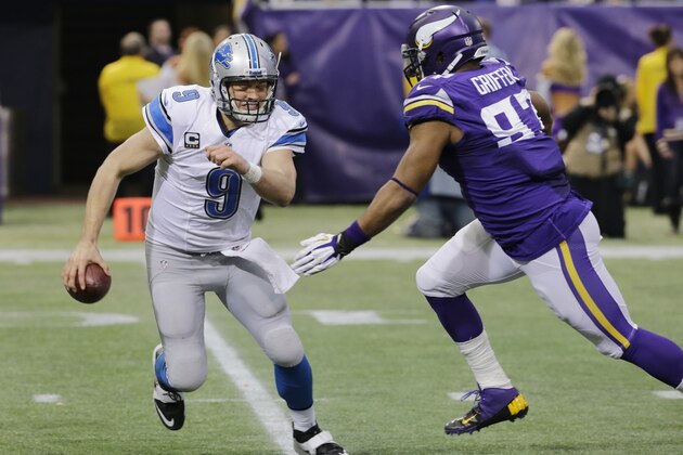 Detroit Lions quarterback Matthew Stafford, left, is sacked by Minnesota Vikings defensive end Everson Griffen during the second half of an NFL football game, Sunday, Dec. 29, 2013, in Minneapolis. The Vikings won 14-13. (AP Photo/Ann Heisenfelt)