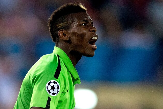 MADRID, SPAIN - OCTOBER 01:  Paul Pogba of Juventus reacts during the UEFA Champions League group A match between Club Atletico de Madrid and Juventus at Vievnte Calderon Stadium on October 1, 2014 in Madrid, Spain.  (Photo by Gonzalo Arroyo Moreno/Getty Images)