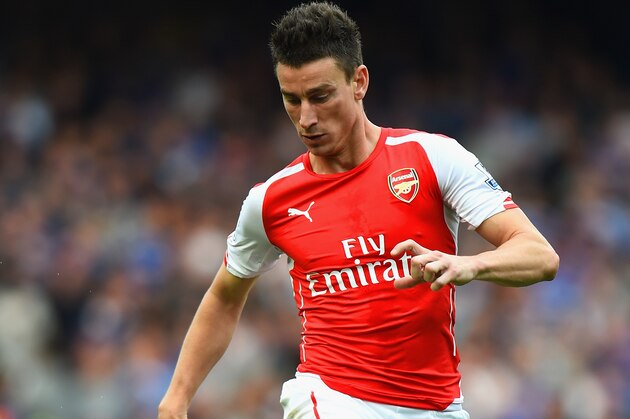 LONDON, ENGLAND - OCTOBER 05:  Laurent Koscielny of Arsenal controls the ball during the Barclays Premier League match between Chelsea and Arsenal at Stamford Bridge on October 4, 2014 in London, England.  (Photo by Shaun Botterill/Getty Images)