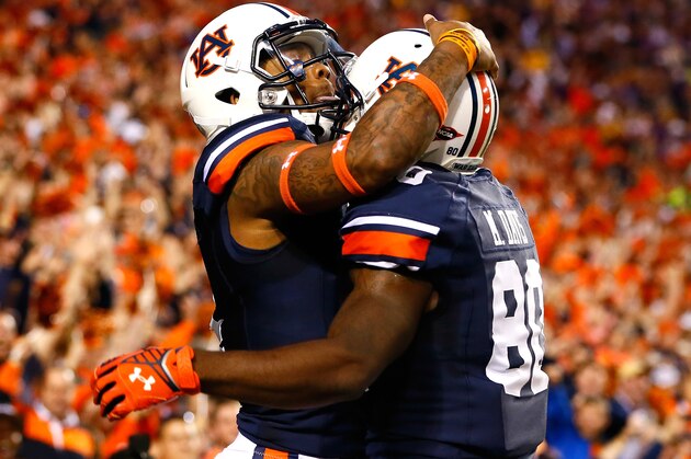 AUBURN, AL - OCTOBER 04:  Nick Marshall #14 of the Auburn Tigers reacts after scoring a touchdown against the LSU Tigers with Marcus Davis #80 at Jordan Hare Stadium on October 4, 2014 in Auburn, Alabama.  (Photo by Kevin C. Cox/Getty Images)